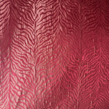 Red fabric with a zebra stripe pattern