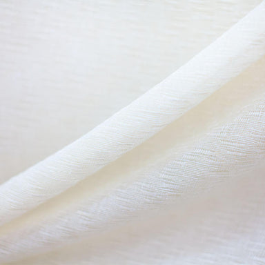 Anthony fabric in color Ivory showcasing fabric solid textured sheer drapery & curtain fabric.