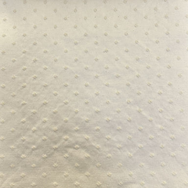 Chelsea fabric in color Natural/Washed showcasing fabric embossed dotted jacquard upholstery fabric & drapery & curtain fabric.