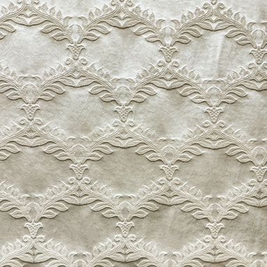Diamond fabric in color Natural/Washed showcasing fabric embossed floral diamond shape upholstery fabric & drapery & curtain fabric.