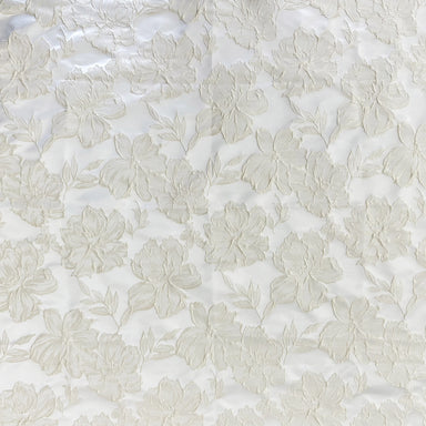 Haiden fabric in color White showcasing fabric shiny floral jacquard drapery & curtain fabric.