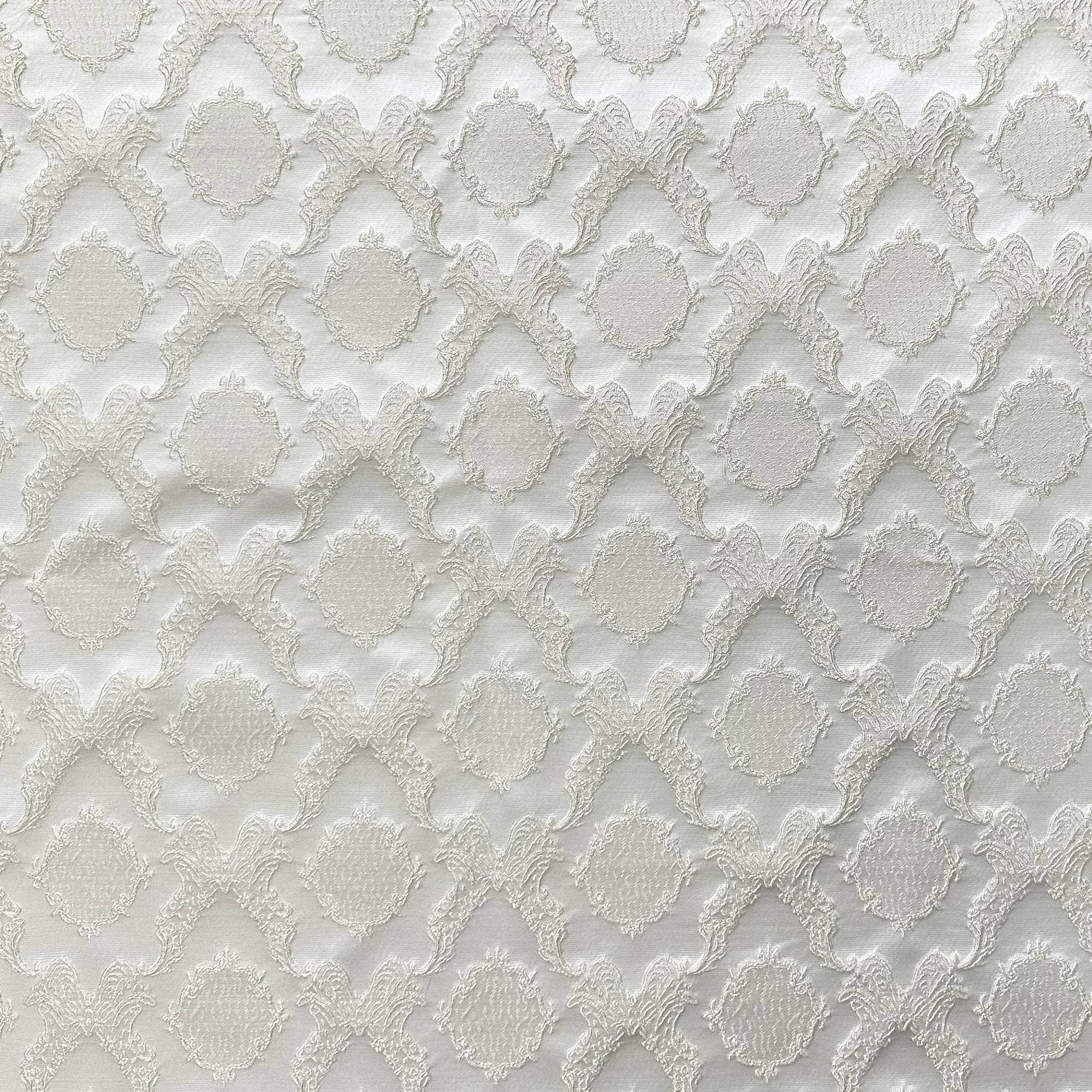 Magda fabric in color White showcasing fabric shiny diamond/round shaped damask embossed jacquard drapery & curtain fabric.