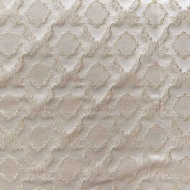 Magda fabric in color Champagne showcasing fabric shiny diamond/round shaped damask embossed jacquard drapery & curtain fabric.