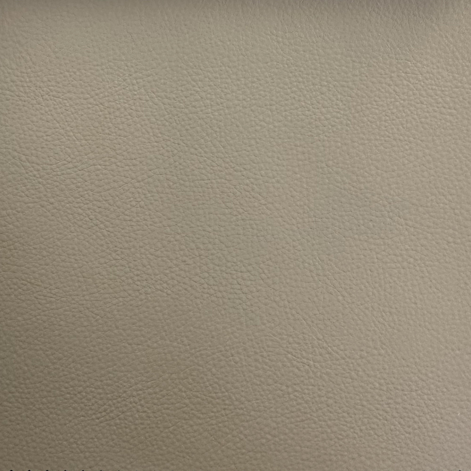 Pelle fabric in color Tan showcasing fabric solid faux leather upholstery fabric.