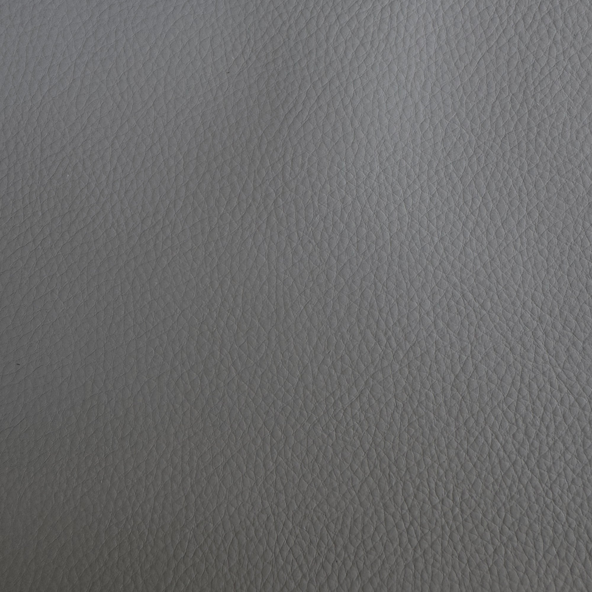 Pelle fabric in color Gray showcasing fabric solid faux leather upholstery fabric.