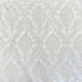 Perla fabric in color White showcasing fabric shiny floral damask jacquard drapery & curtain fabric.