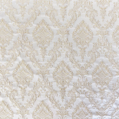 Perla fabric in color Champagne showcasing fabric shiny floral damask jacquard drapery & curtain fabric.