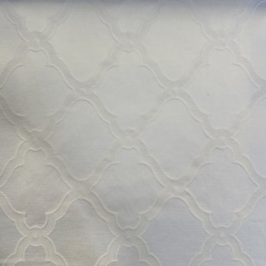 Serena fabric in color White showcasing fabric embossed diamond shaped geometric jacquard upholstery fabric & drapery & curtain fabric.