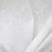 Aladdin fabric in color Ivory showcasing fabric embroidered sheer drapery & curtain fabric.