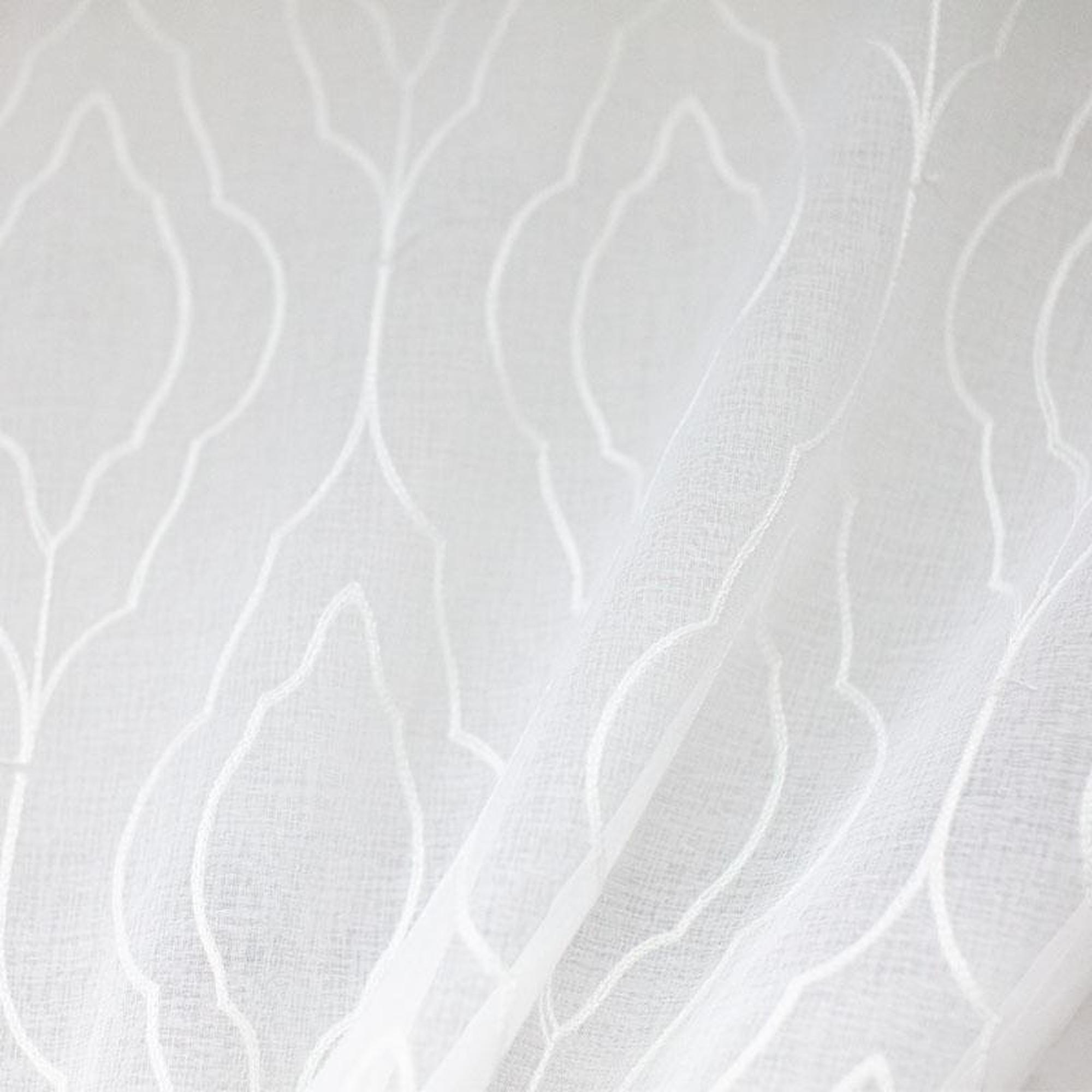 Ambra fabric in color White showcasing fabric geometric embroidered sheer drapery & curtain fabric.
