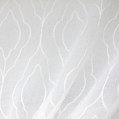 Ambra fabric in color White showcasing fabric geometric embroidered sheer drapery & curtain fabric.