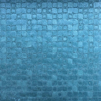 Baxter fabric in color Peacock showcasing fabric embossed nrick-like velvet upholstery fabric.
