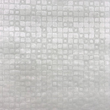 Baxter fabric in color White showcasing fabric embossed nrick-like velvet upholstery fabric.