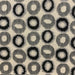 Edina fabric in color Ebony showcasing fabric circular jacquard velvet on linen look upholstery fabric.