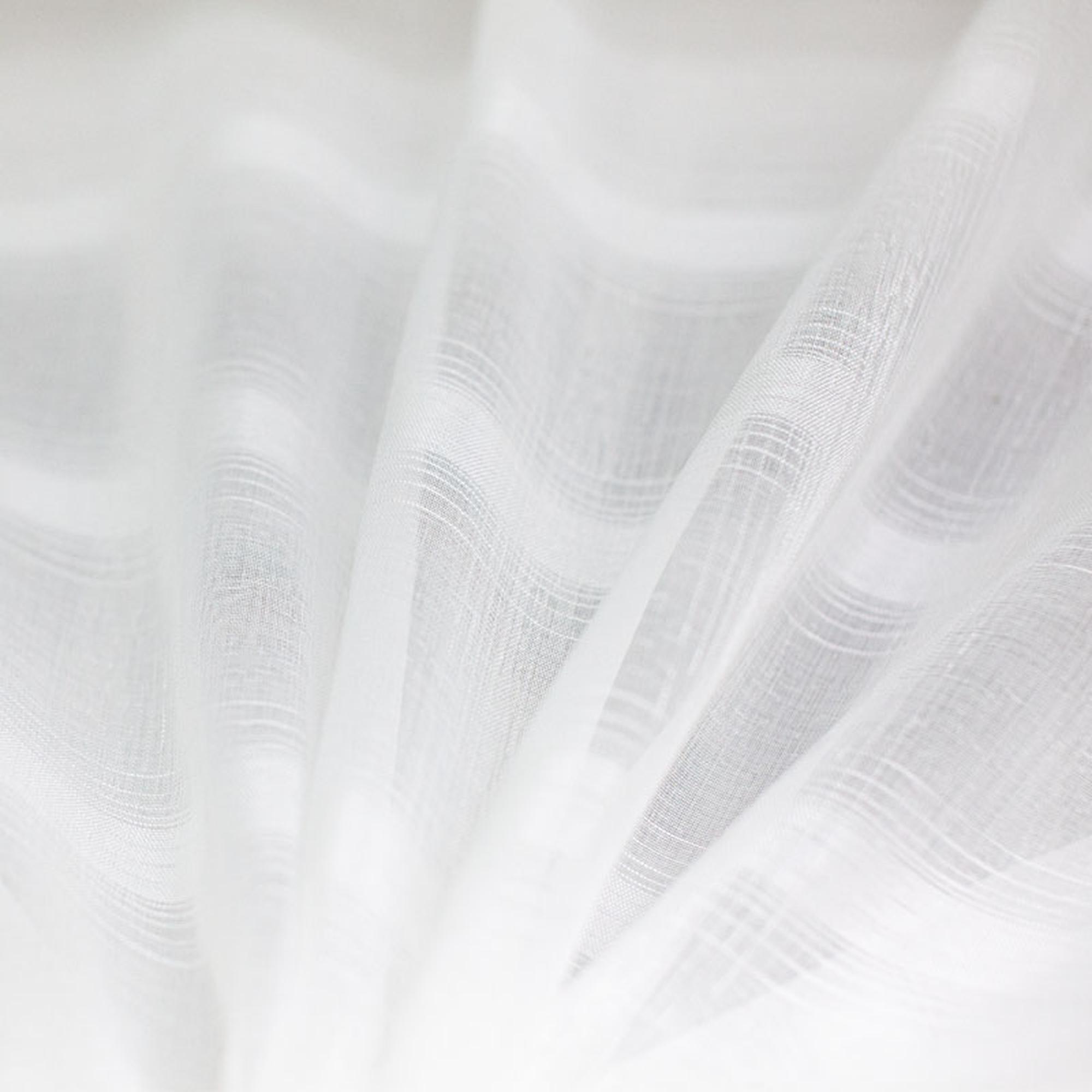 White lightweight sheer fabric with a refined texture, ideal for curtains and drapery. High-quality and stylish for any space.