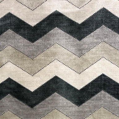 Fabiana fabric in color Taupe showcasing fabric zig-zag chevron cut velvet upholstery fabric.