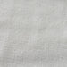 Giona fabric in color White showcasing fabric textured solid sheer drapery & curtain fabric.