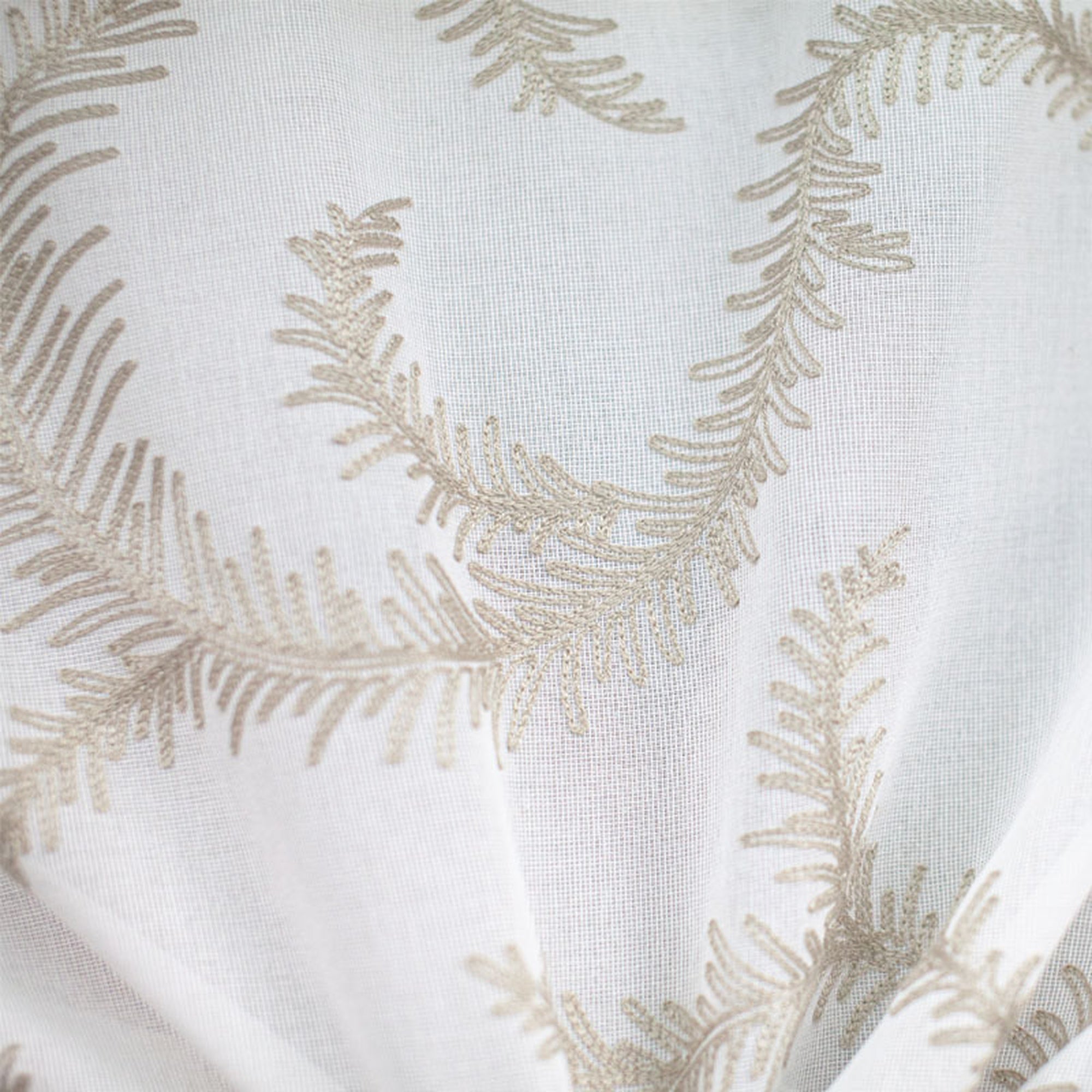 Karen fabric in color Beige showcasing fabric embroidered floral sheer drapery & curtain fabric.
