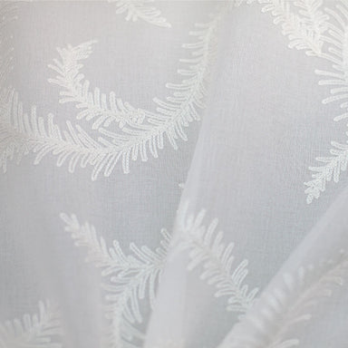 Karen fabric in color Ivory showcasing fabric embroidered floral sheer drapery & curtain fabric.