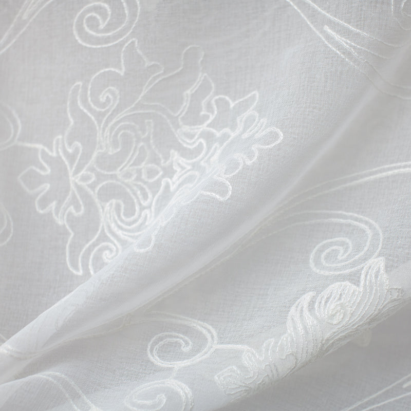 White elegant damask fabric with a refined texture, ideal for various interior design applications. High-quality and stylish for any space.