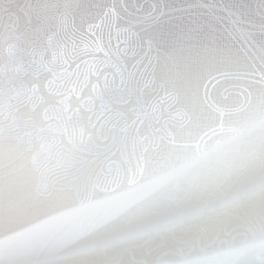 Bali fabric in color Ivory showcasing fabric embroidered damask sheer.