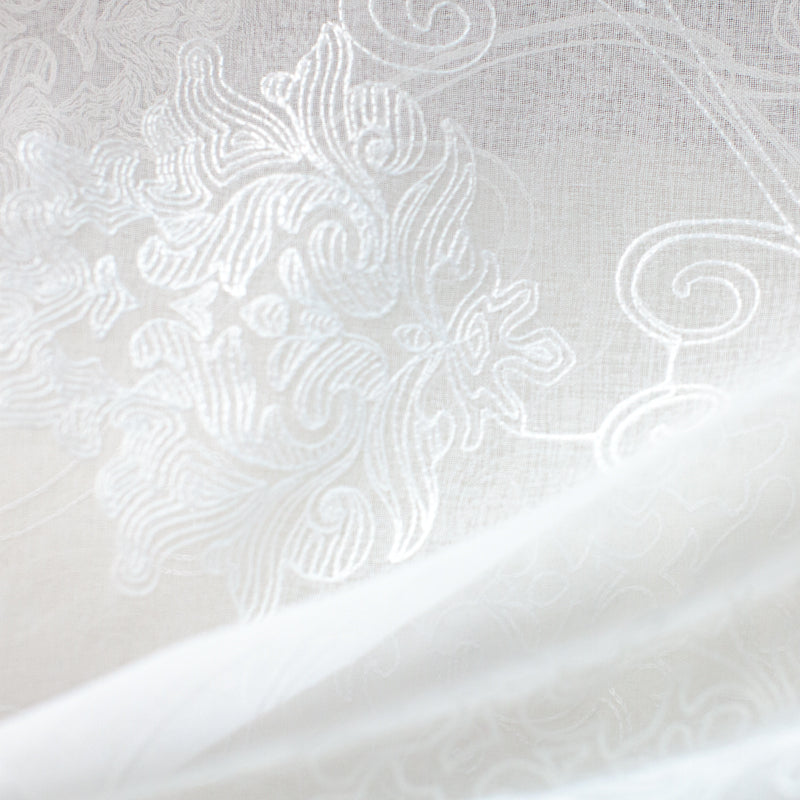 Bali fabric in color Ivory showcasing fabric embroidered damask sheer.
