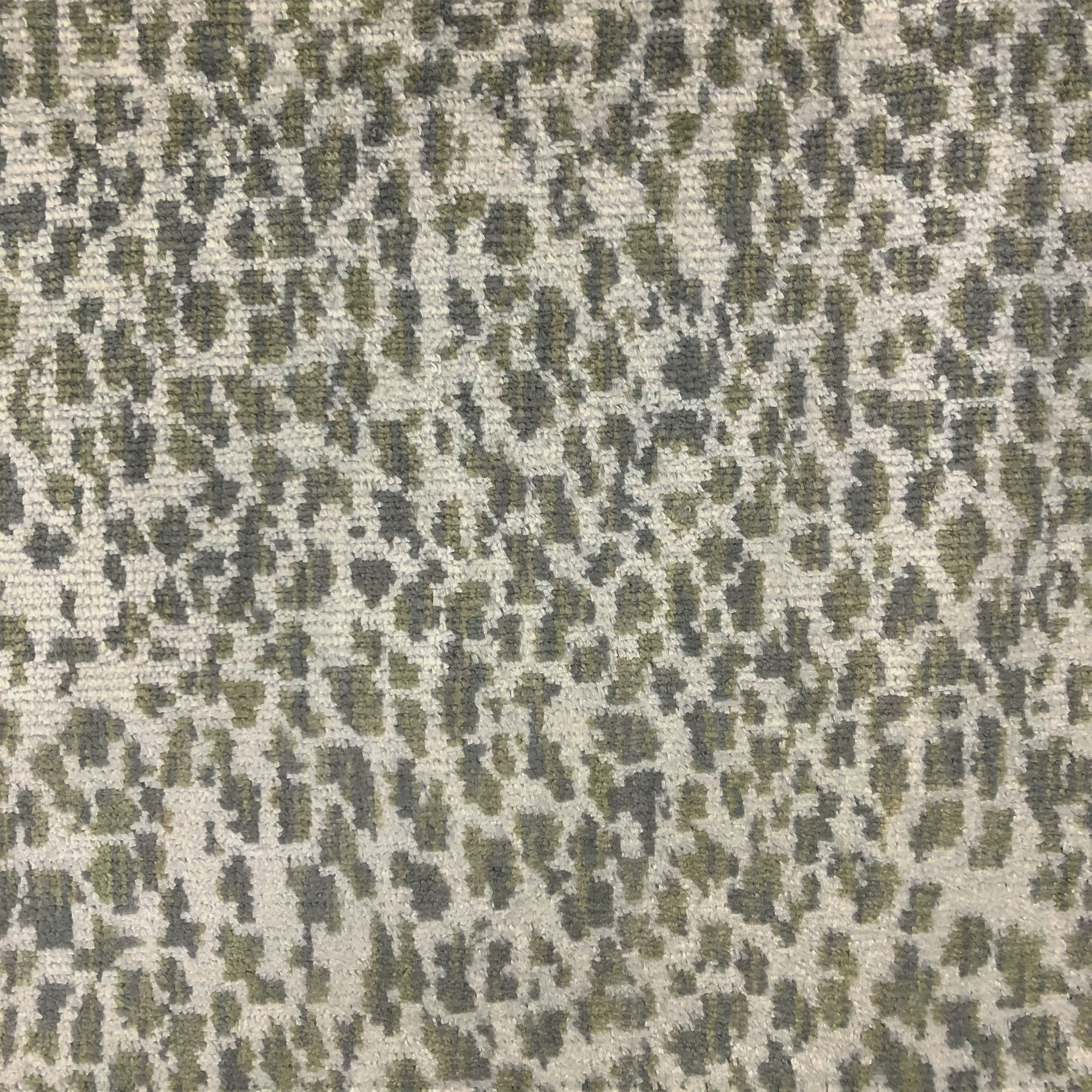 Lepard fabric in color Taupe showcasing fabric animal print velvet on linen look upholstery fabric.