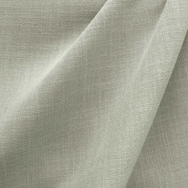 Linati fabric in color Silver showcasing fabric solid linen look upholstery fabric & drapery & curtain fabric & table linen fabric.