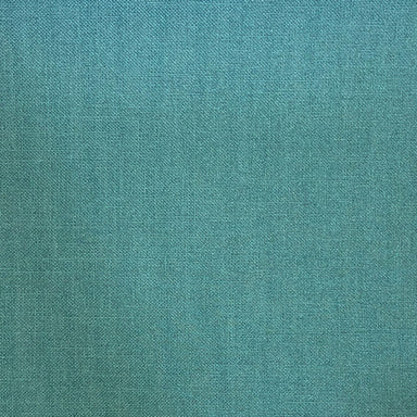 Linnea fabric in color Turquoise showcasing fabric solid textured w/ backing upholstery fabric & drapery & curtain fabric.
