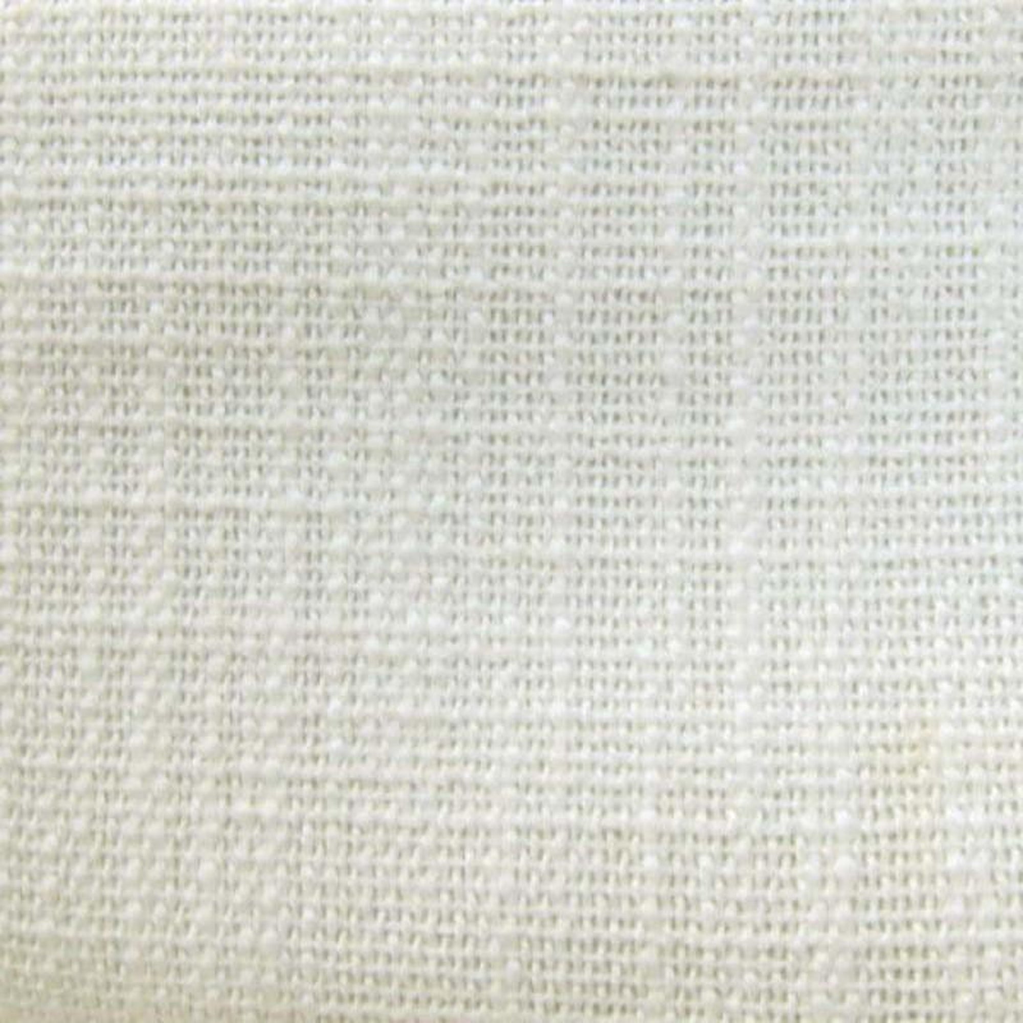 Malpensa fabric in color Ivory showcasing fabric solid textured linen look upholstery fabric.