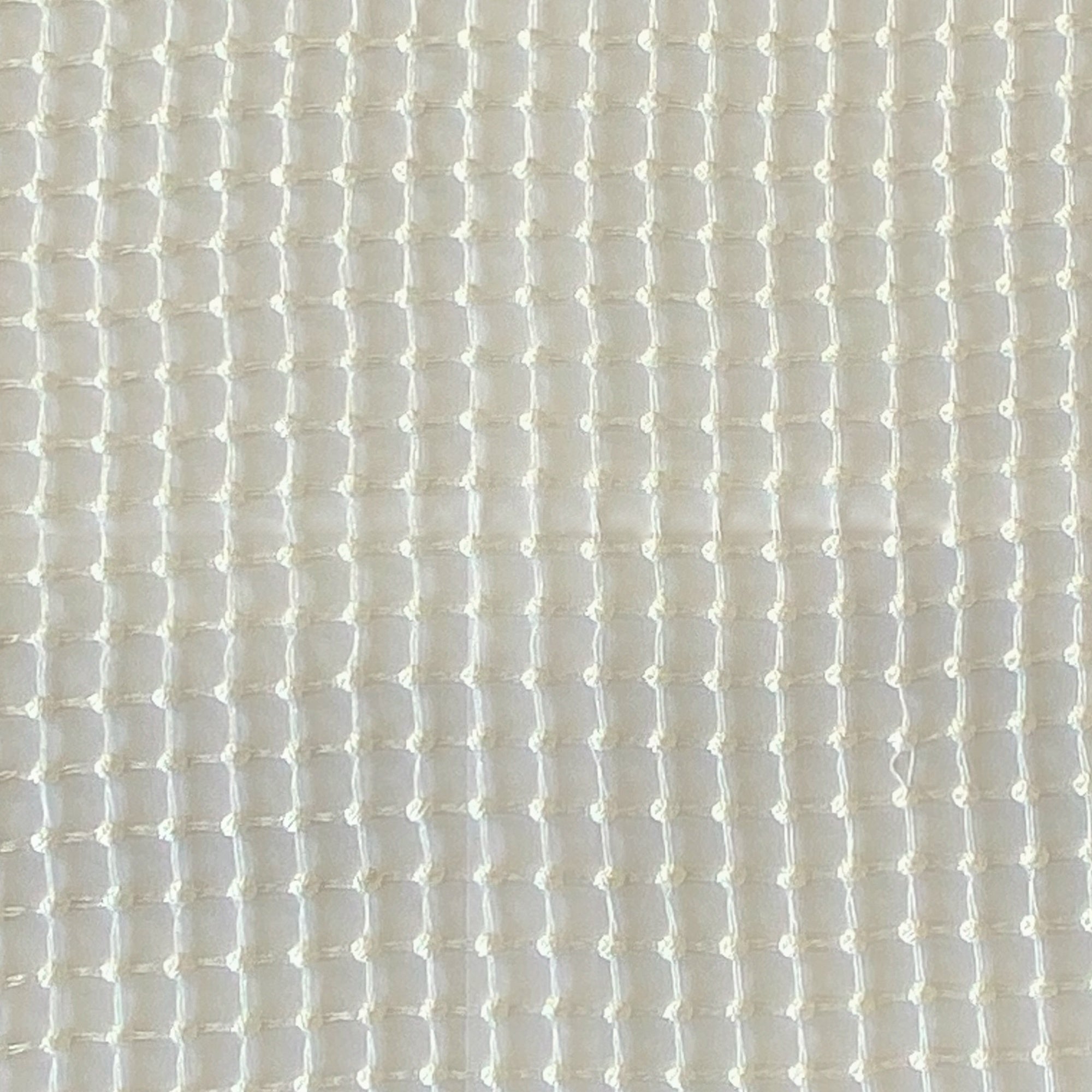 Netta fabric in color Ivory showcasing fabric net like dotted sheer drapery & curtain fabric.
