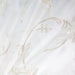 Park fabric in color Champagne showcasing fabric floral embroidered metallic sheer drapery & curtain fabric.
