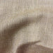 Pixie fabric in color Latte showcasing fabric solid metallic linen blend upholstery fabric & drapery & curtain fabric.