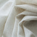 Ronan fabric in color Linen showcasing fabric solid linen-look sheer drapery & curtain fabric.