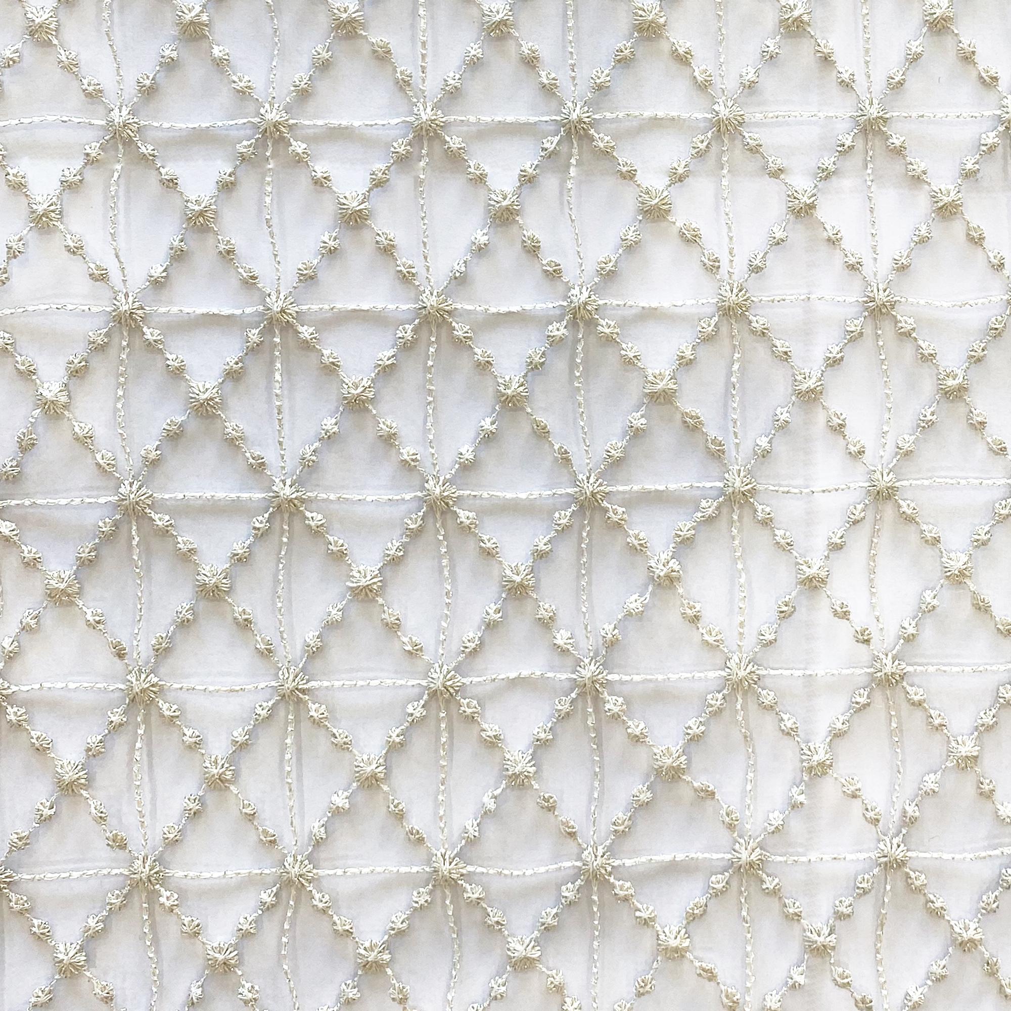 Sanders fabric in color Ivory showcasing fabric net like diamond shaped sheer drapery & curtain fabric.