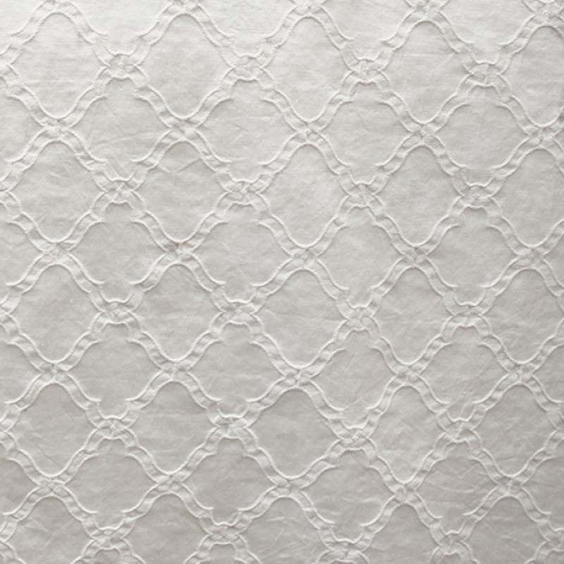 Serena fabric in color Natural/Washed showcasing fabric embossed diamond shaped geometric jacquard upholstery fabric & drapery & curtain fabric.