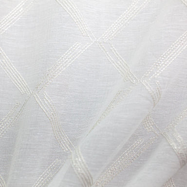 Teresa fabric in color Natural showcasing fabric diamond metallic embroidered sheer drapery & curtain fabric.