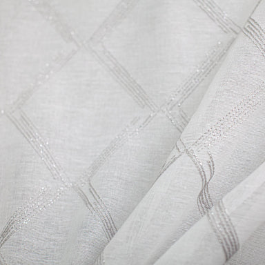 Teresa fabric in color Silver showcasing fabric diamond metallic embroidered sheer drapery & curtain fabric.