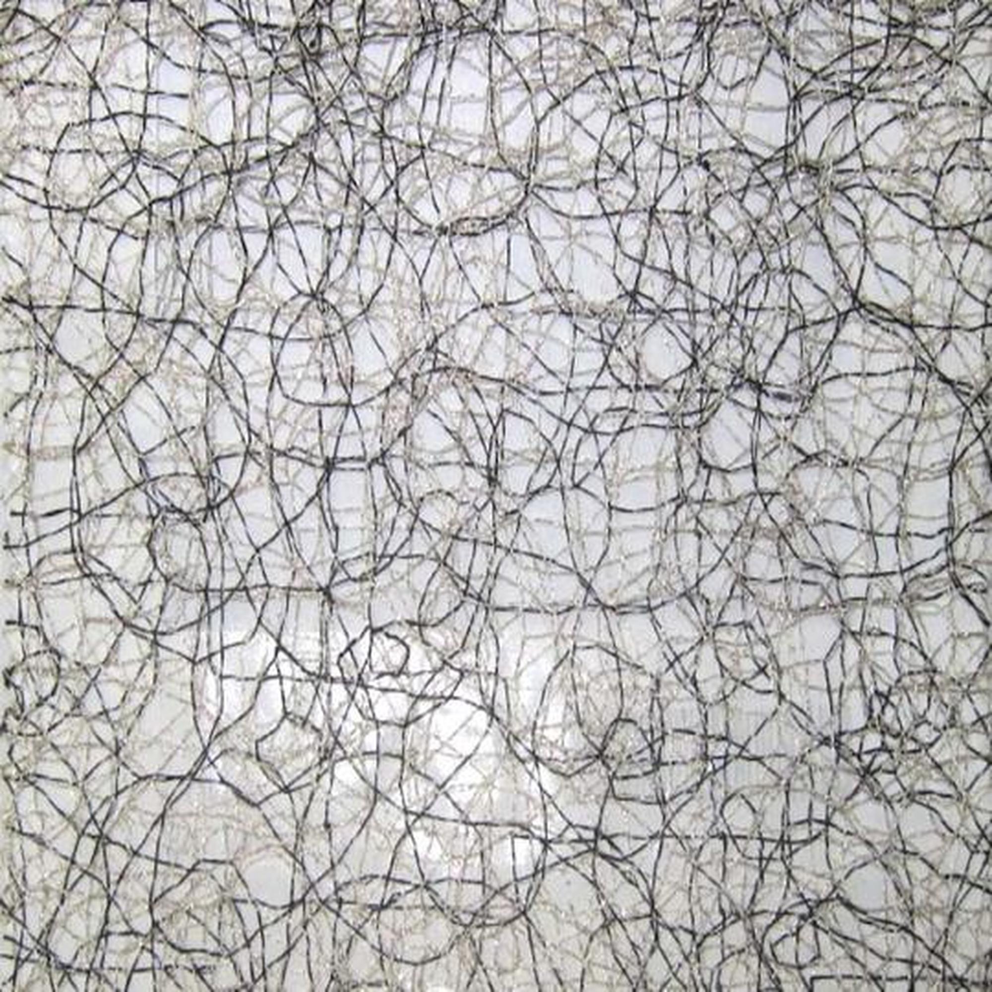 Twilight fabric in color Onyx showcasing fabric swirl like metallic sheer drapery & curtain fabric.