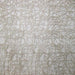 Twilight fabric in color Oyster showcasing fabric swirl like metallic sheer drapery & curtain fabric.