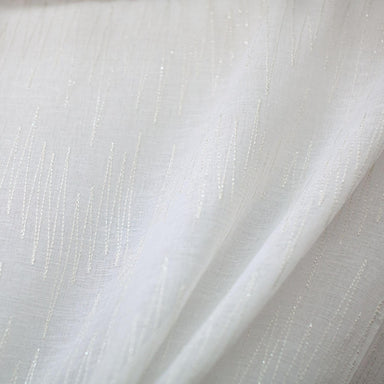 Zeek fabric in color Ivory showcasing fabric zig zag metallic embroidered sheer drapery & curtain fabric.