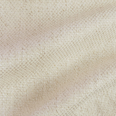 Close-up texture of a beige solid linen blend fabric.